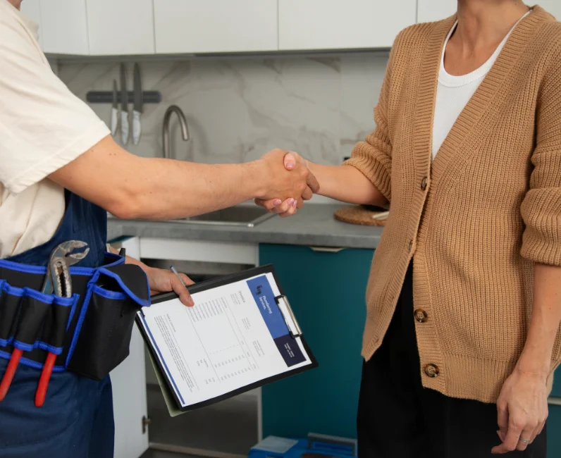 Plumber confirming service completion with customer – Plumber Pro Dallas