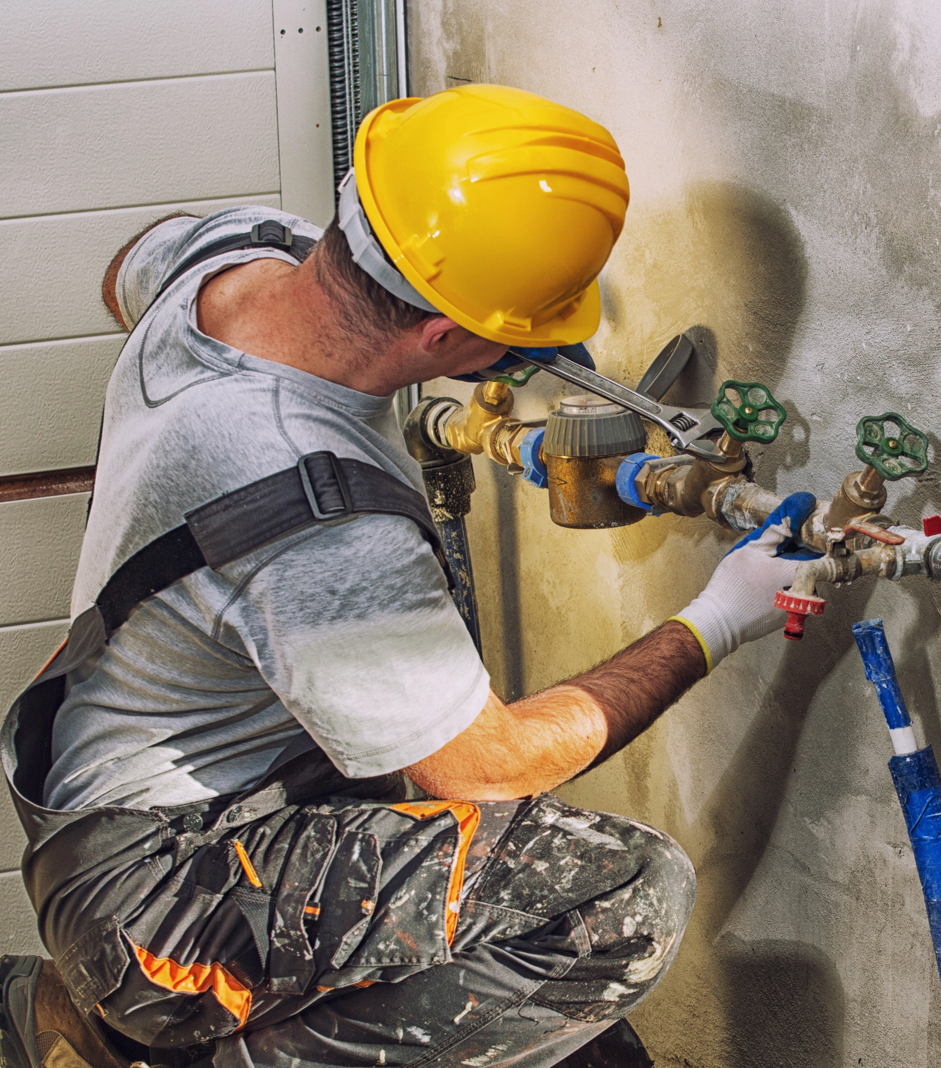 Plumber repairing water valve and pipe connection – Plumber Pro Dallas