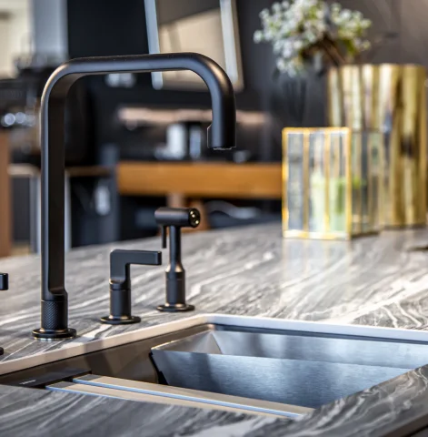 Plumber installing bathroom sink faucet and fittings – Plumber Pro Dallas