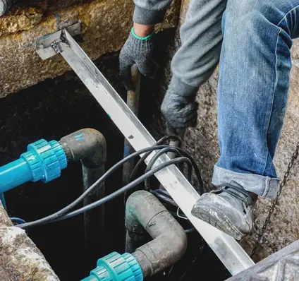 Worker Repairing Sewer Line - Plumber Pro Dallas