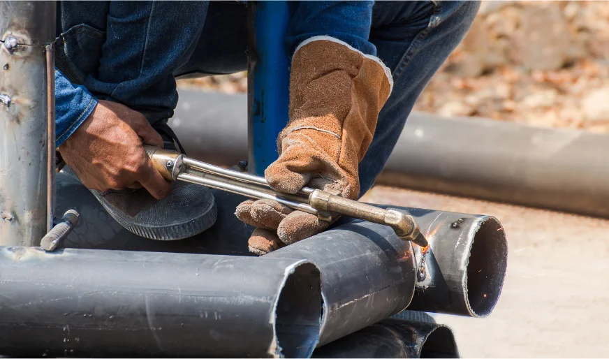 Plumber repairing underground sewer pipe connection – Plumber Pro Dallas