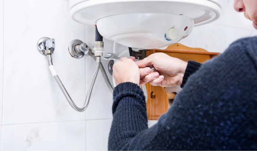 Plumber installing water heater supply lines – Plumber Pro Dallas